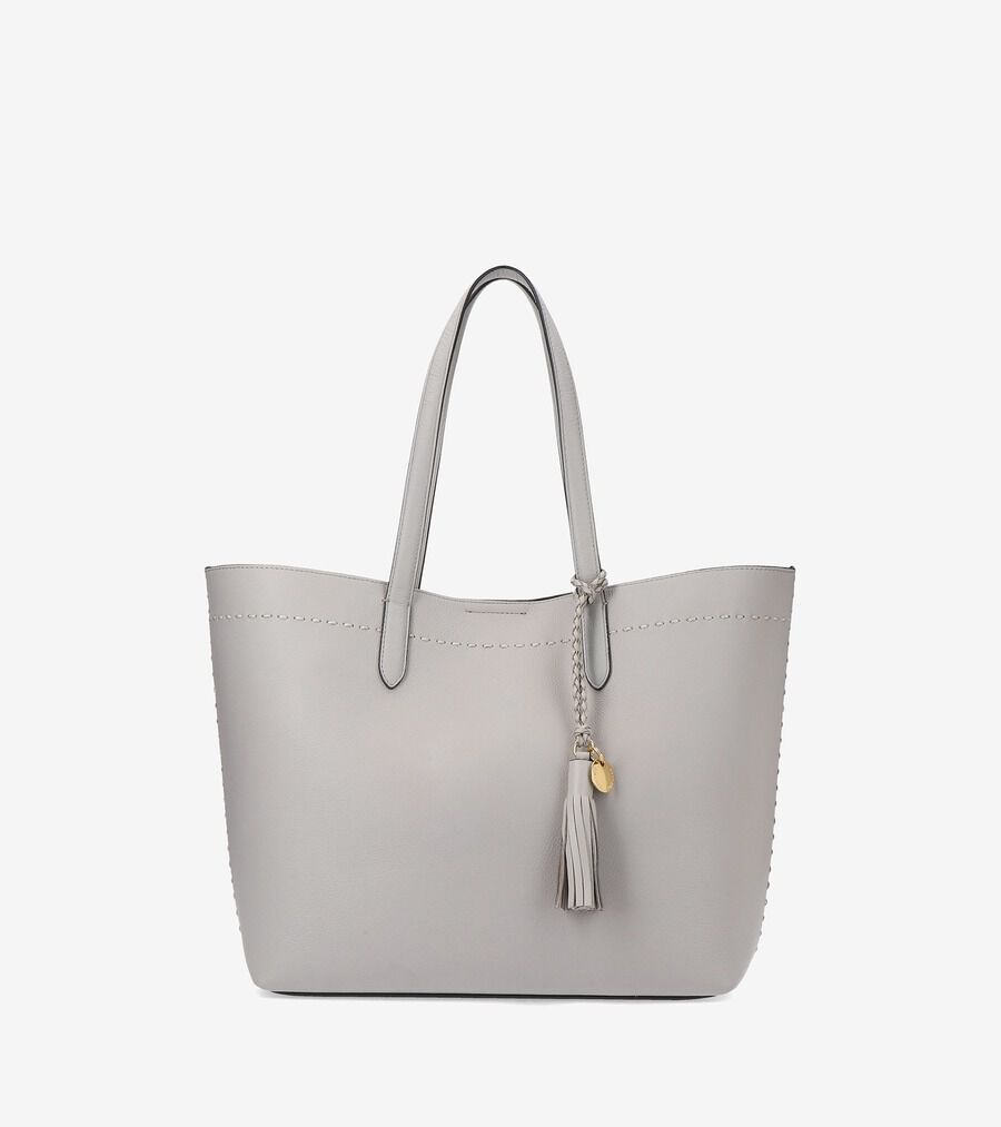 【COLE HAAN】コロンと丸く可愛い フルレザーのトート アイボリー Women's Midtown Work Tote Bag in Navy | Cole Haan